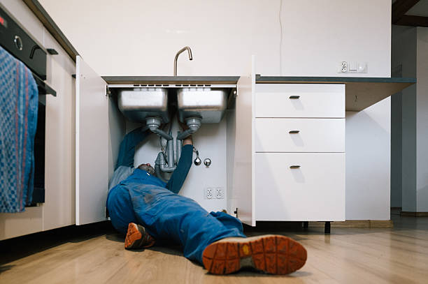 Professional Plumbing technician working in Ixonia, WI